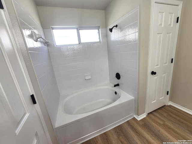 9639 Wild Horse, San Antonio, TX 78251 - bathroom featuring wood finished floors,  shower combination, and baseboards