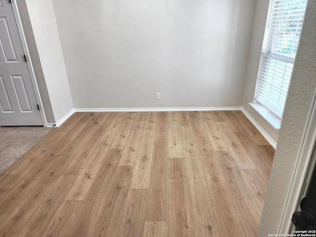 9639 Wild Horse, San Antonio, TX 78251 - empty room featuring light wood-type flooring and baseboards