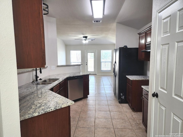 9639 Wild Horse, San Antonio, TX 78251 - kitchen featuring dishwasher, a sink, ceiling fan, light stone countertops, and light tile patterned floors