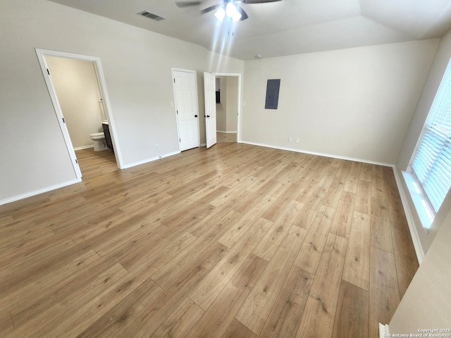 9639 Wild Horse, San Antonio, TX 78251 - unfurnished bedroom featuring light wood-style floors, electric panel, ensuite bath, and baseboards