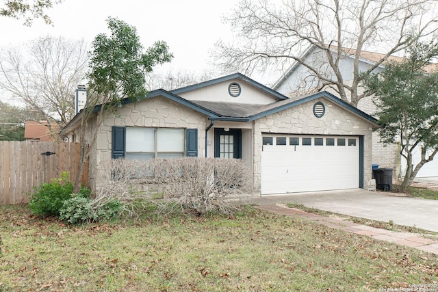 ranch-style home featuring an attached garage, driveway, and fence