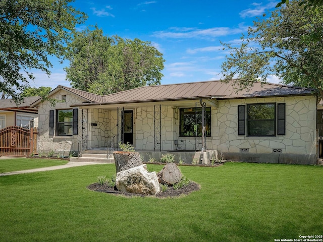 227 Cromwell, San Antonio, TX 78228 - ranch-style house featuring a standing seam roof, stone siding, and a front yard
