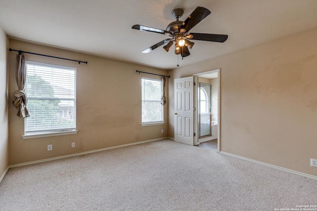 9007 Burnt Peak, Helotes, TX 78023 - unfurnished room with a ceiling fan, light carpet, and baseboards