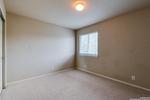 9007 Burnt Peak, Helotes, TX 78023 - carpeted empty room with baseboards