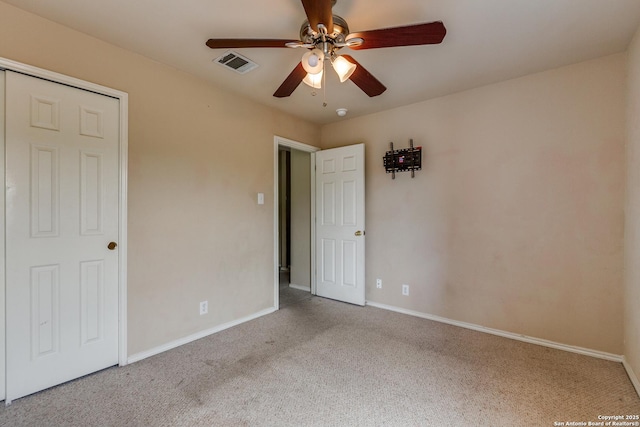9007 Burnt Peak, Helotes, TX 78023 - unfurnished bedroom with carpet floors, baseboards, and a ceiling fan