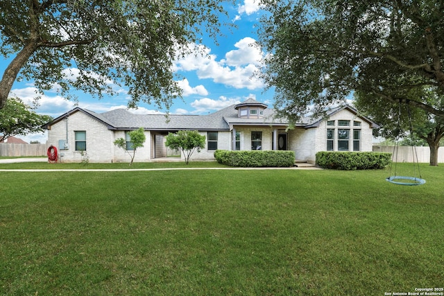 single story home with brick siding