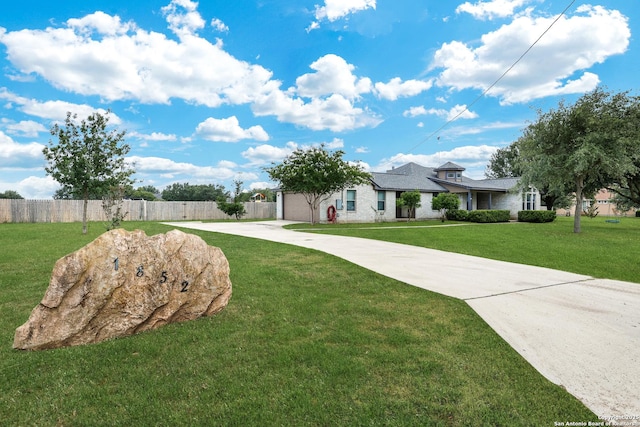 view of front of house featuring driveway and an attached garage