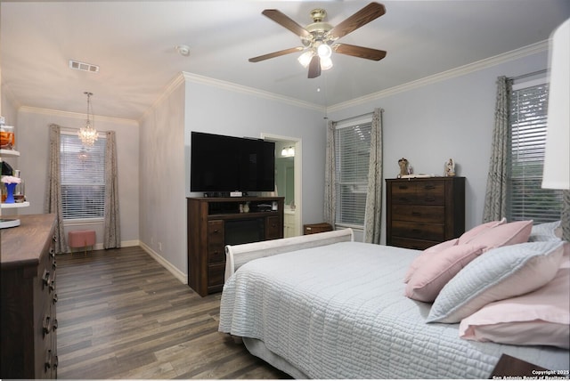 bedroom featuring wood finished floors, baseboards, ornamental molding, and a ceiling fan