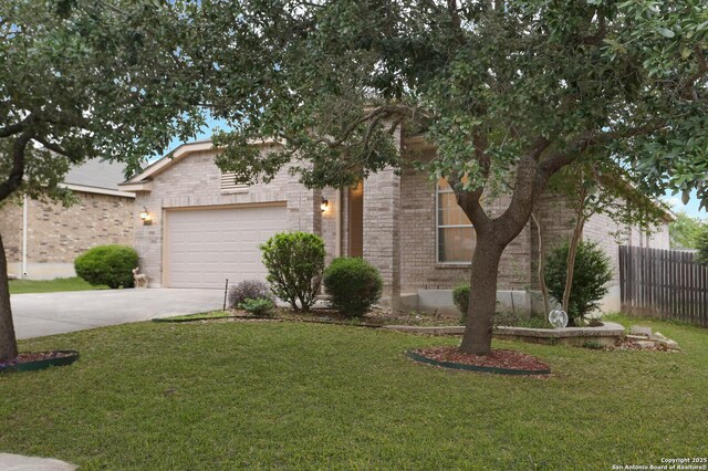 view of front of house featuring driveway, a garage, and brick siding