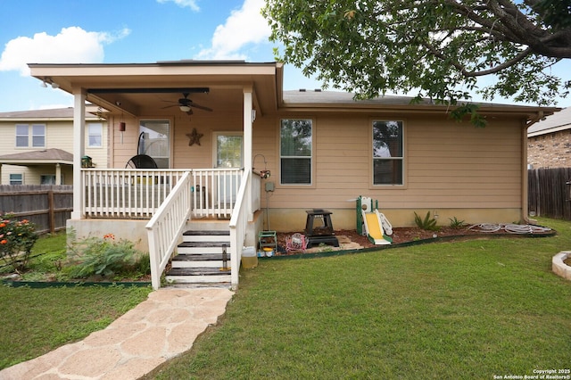 view of front of home with ceiling fan and covered porch