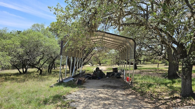 view of property's community with a carport