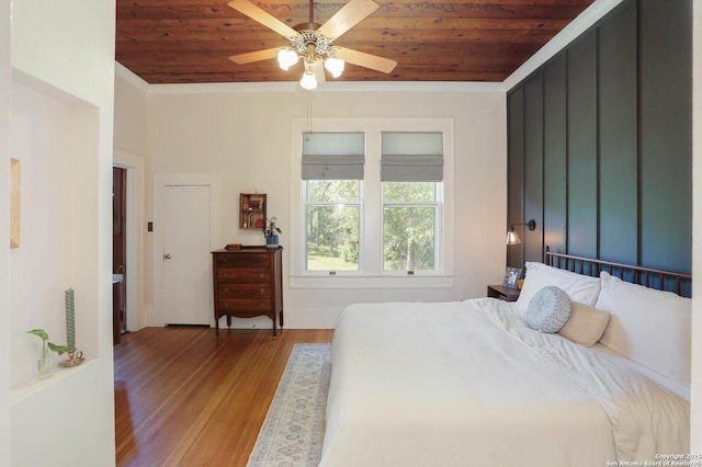 6160 Fm 2538, Marion, TX 78124 - bedroom with wood ceiling, wood finished floors, crown molding, and a ceiling fan