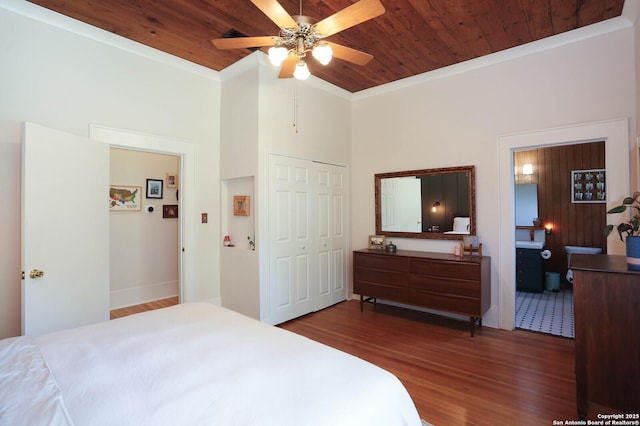 6160 Fm 2538, Marion, TX 78124 - bedroom featuring wood finished floors, ornamental molding, wooden ceiling, a closet, and ensuite bath
