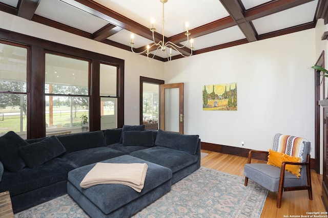 6160 Fm 2538, Marion, TX 78124 - living room with coffered ceiling, a chandelier, wood finished floors, baseboards, and beam ceiling