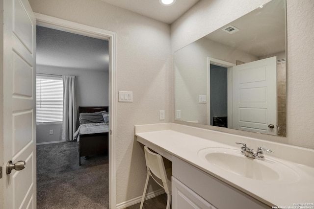 6039 Olson Blfs, San Antonio, TX 78252 - bathroom with vanity and baseboards