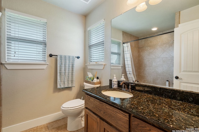 full bath with baseboards, tile patterned flooring, a tile shower, toilet, and vanity