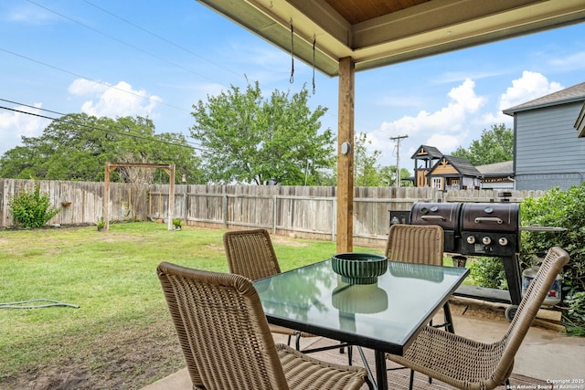 view of patio featuring outdoor dining area
