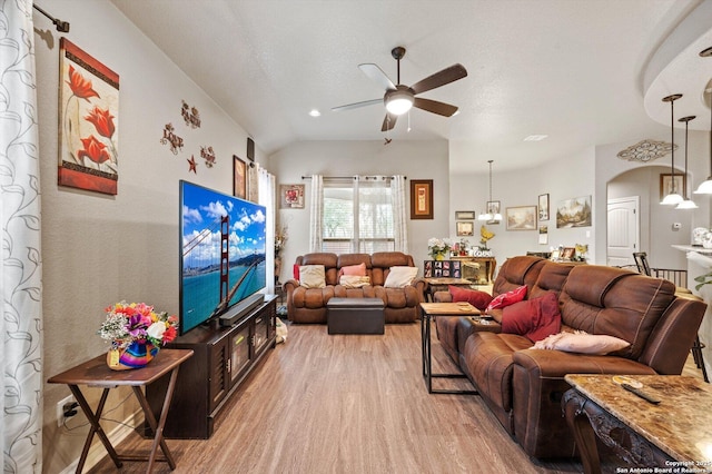 8707 Kallison Arbor, San Antonio, TX 78254 - living room with light wood finished floors, ceiling fan, and arched walkways