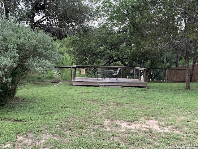 view of yard with a deck