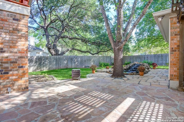 view of patio with a fenced backyard
