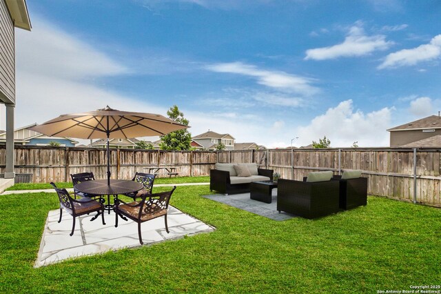 1109 Esplanade Pkwy, San Marcos, TX 78666 - view of yard with an outdoor living space and a patio area