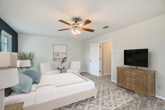 1109 Esplanade Pkwy, San Marcos, TX 78666 - bedroom with carpet flooring, baseboards, and ceiling fan