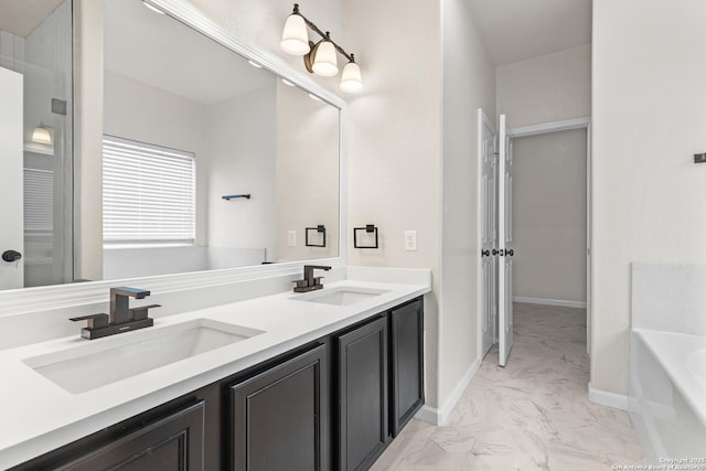 3727 Columbia, Cibolo, TX 78108 - full bathroom featuring marble finish floors, double vanity, a bath, and baseboards