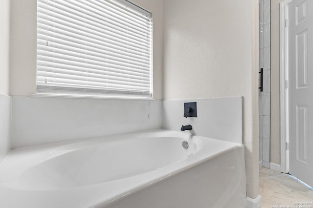 3727 Columbia, Cibolo, TX 78108 - full bathroom featuring a bath and marble look tile flooring