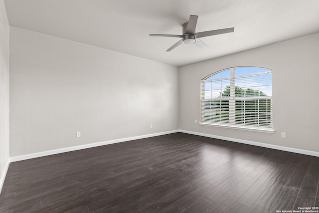 3727 Columbia, Cibolo, TX 78108 - spare room featuring a ceiling fan, baseboards, and dark wood-type flooring