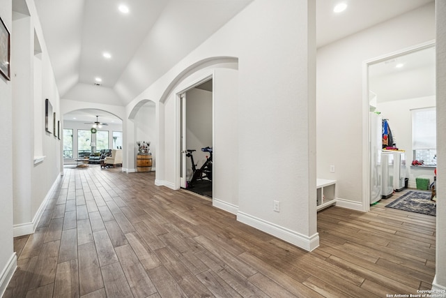 14074 May Mist, San Antonio, TX 78253 - hallway with wood finished floors, arched walkways, lofted ceiling, recessed lighting, and baseboards