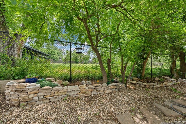 239 Old Oaks, Kerrville, TX 78028 - view of yard featuring fence