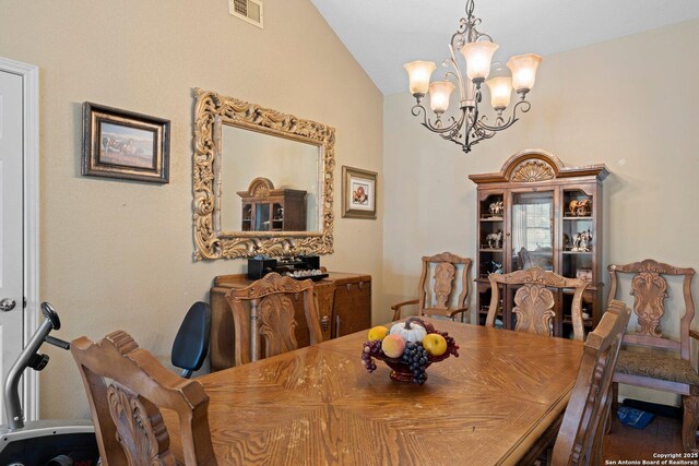 239 Old Oaks, Kerrville, TX 78028 - dining area with a chandelier and vaulted ceiling