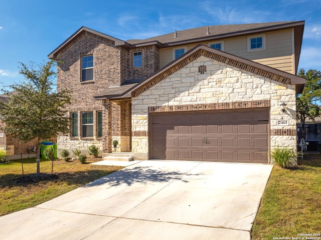 2465 Pennilynn, San Antonio, TX 78253 - traditional home featuring stone siding, an attached garage, driveway, and brick siding