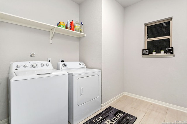 2465 Pennilynn, San Antonio, TX 78253 - laundry area with washer and clothes dryer and baseboards