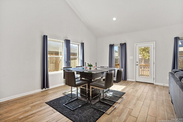 2465 Pennilynn, San Antonio, TX 78253 - dining room with light wood-type flooring, high vaulted ceiling, and baseboards