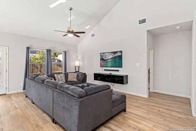 2465 Pennilynn, San Antonio, TX 78253 - living area with a ceiling fan, light wood finished floors, baseboards, and high vaulted ceiling