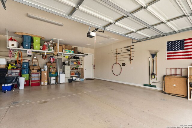 garage featuring a garage door opener