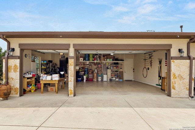 garage featuring driveway