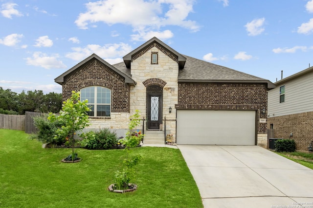 french provincial home featuring brick siding, stone siding, a shingled roof, and an attached garage