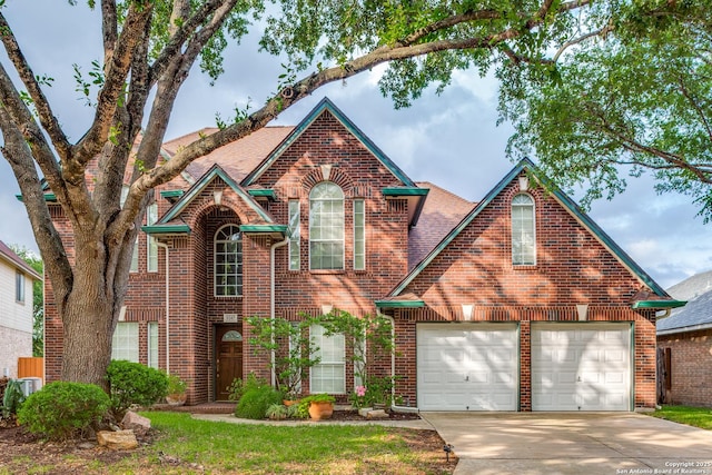 9347 Llano Verde, Helotes, TX 78023 - view of front of house featuring concrete driveway and brick siding
