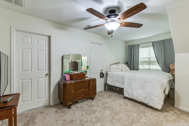 9347 Llano Verde, Helotes, TX 78023 - bedroom featuring light colored carpet and a ceiling fan