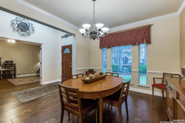 9347 Llano Verde, Helotes, TX 78023 - dining room featuring crown molding, a chandelier, dark wood-type flooring, and baseboards