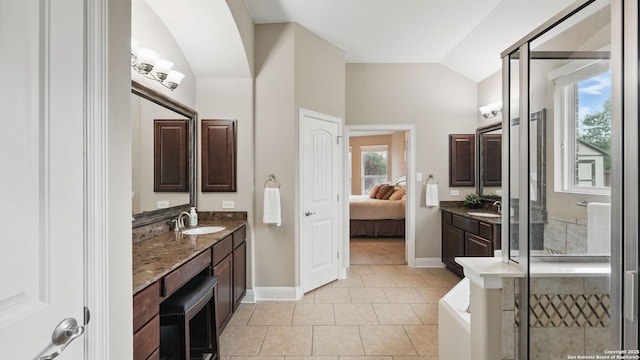 3318 Jasons, Marion, TX 78124 - bathroom featuring vaulted ceiling, tile patterned floors, ensuite bathroom, baseboards, and vanity