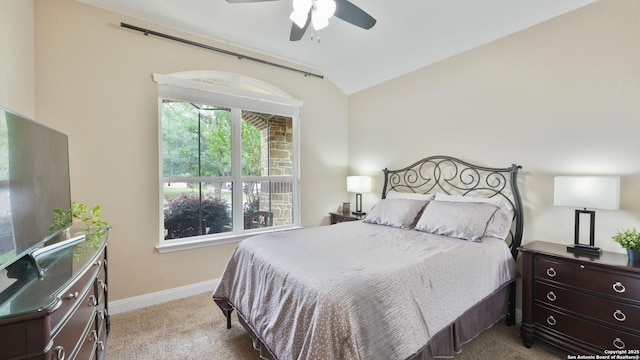3318 Jasons, Marion, TX 78124 - bedroom featuring carpet floors, lofted ceiling, multiple windows, baseboards, and a ceiling fan