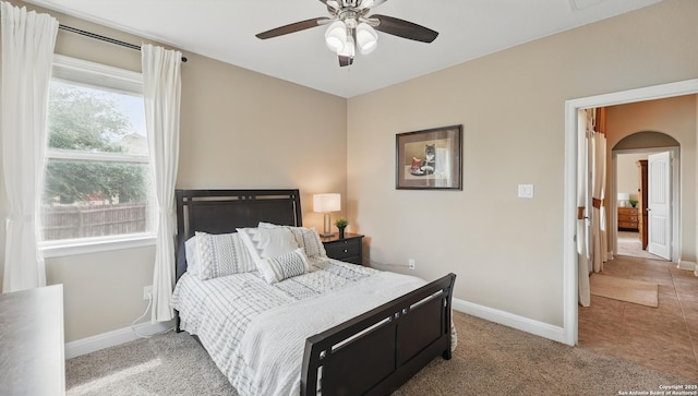 3318 Jasons, Marion, TX 78124 - carpeted bedroom with baseboards, arched walkways, and a ceiling fan