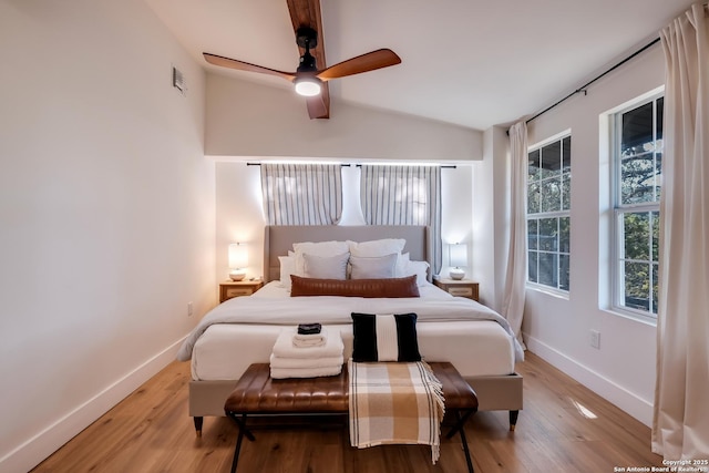 5A Rolling Acres Rd, Boerne, TX 78006 - bedroom featuring baseboards, light wood finished floors, vaulted ceiling, and a ceiling fan