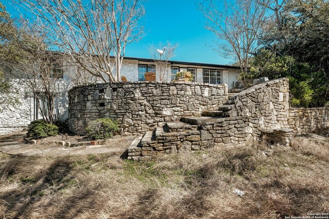 5A Rolling Acres Rd, Boerne, TX 78006 - view of front of home featuring stone siding