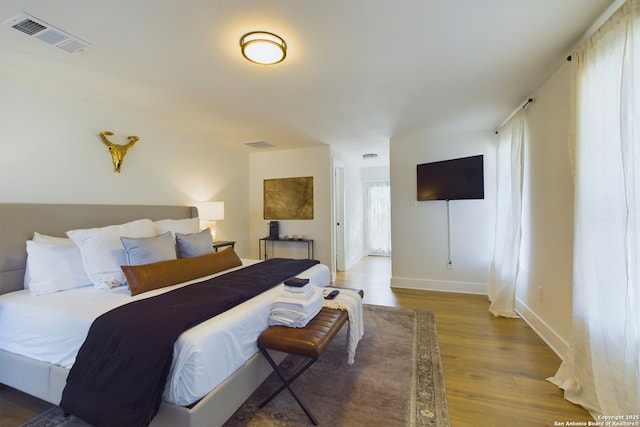 5A Rolling Acres Rd, Boerne, TX 78006 - bedroom with wood finished floors and baseboards