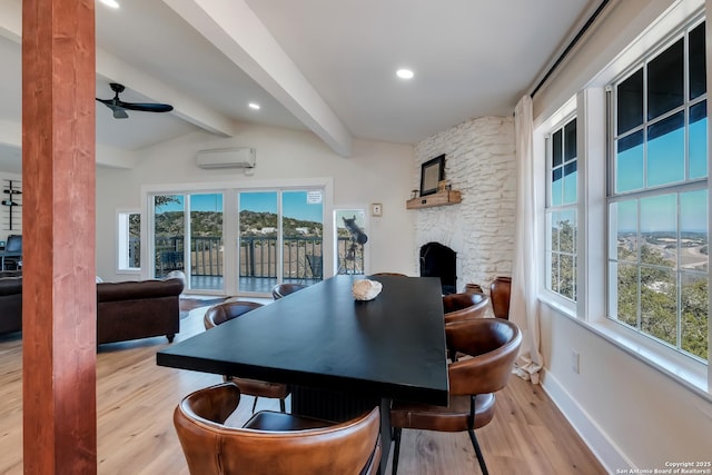 5A Rolling Acres Rd, Boerne, TX 78006 - dining room with wood finished floors, a ceiling fan, a wall mounted AC, plenty of natural light, and recessed lighting