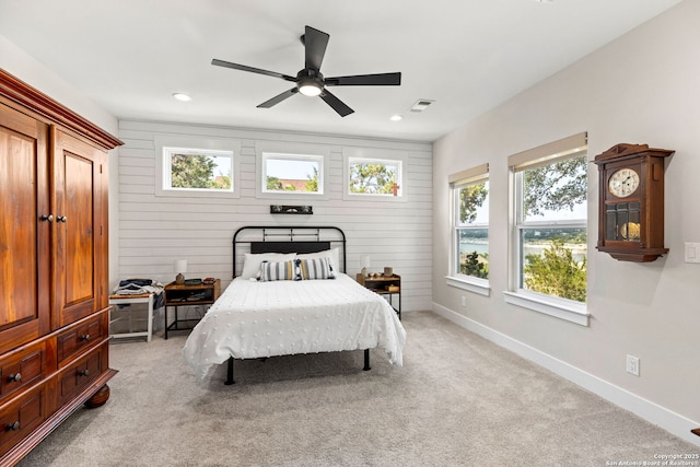 bedroom with baseboards, light carpet, recessed lighting, and ceiling fan